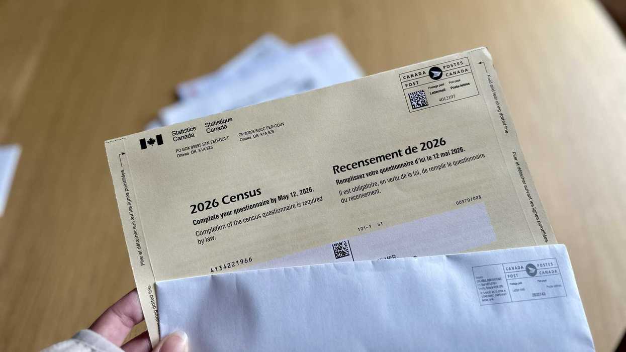 person holding 2026 census letter from statistics canada