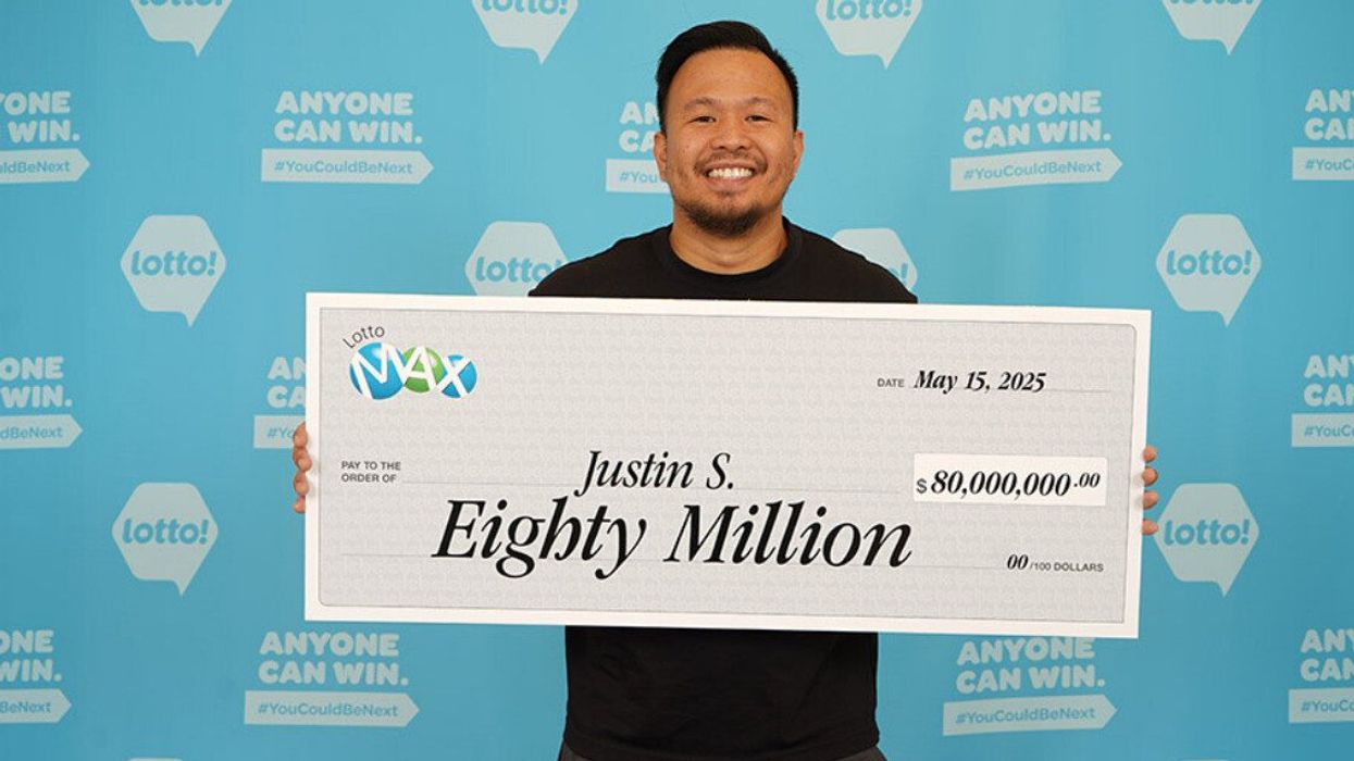 Person holding a lotto max win
