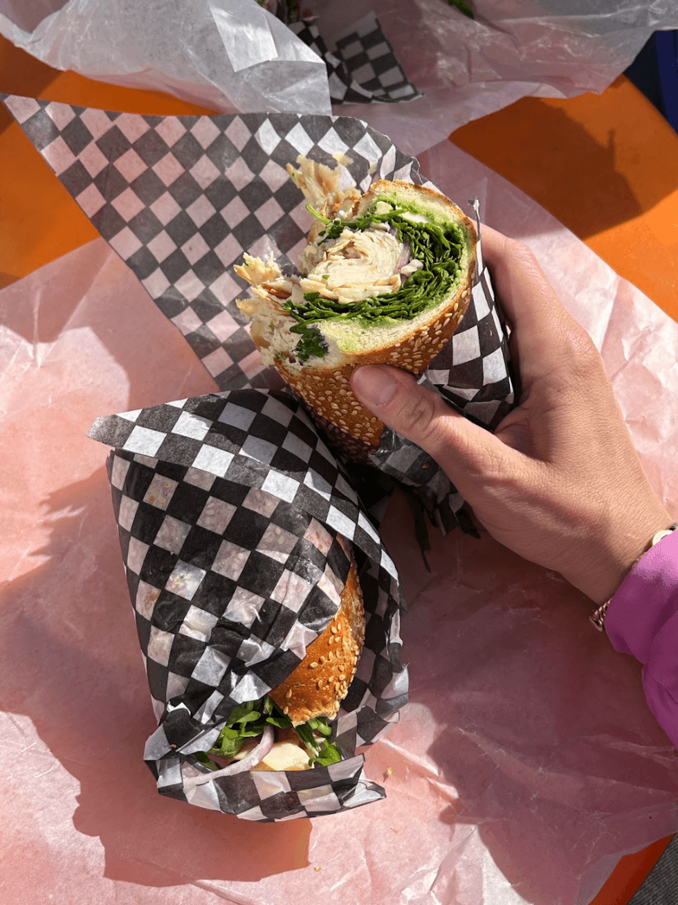 Person holding a sandwich.