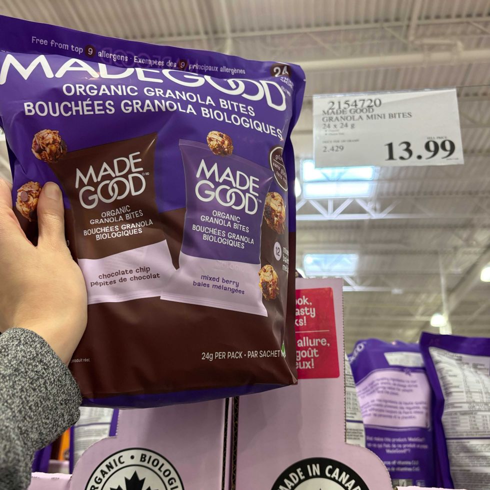 person holding bag of made good granola bites at costco