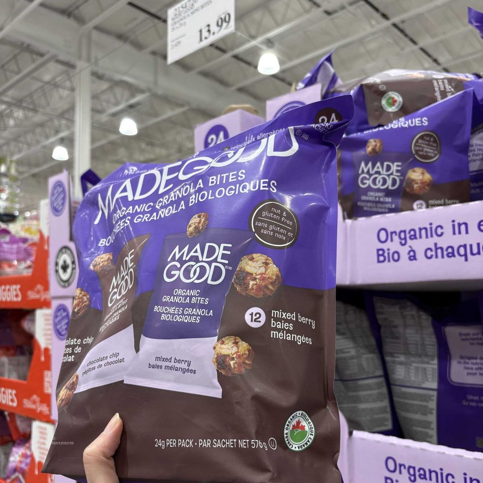 person holding bag of Made Good granola bites at Costco