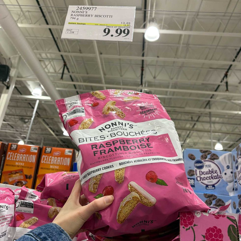person holding bag of Nonni's raspberry biscotti at costco