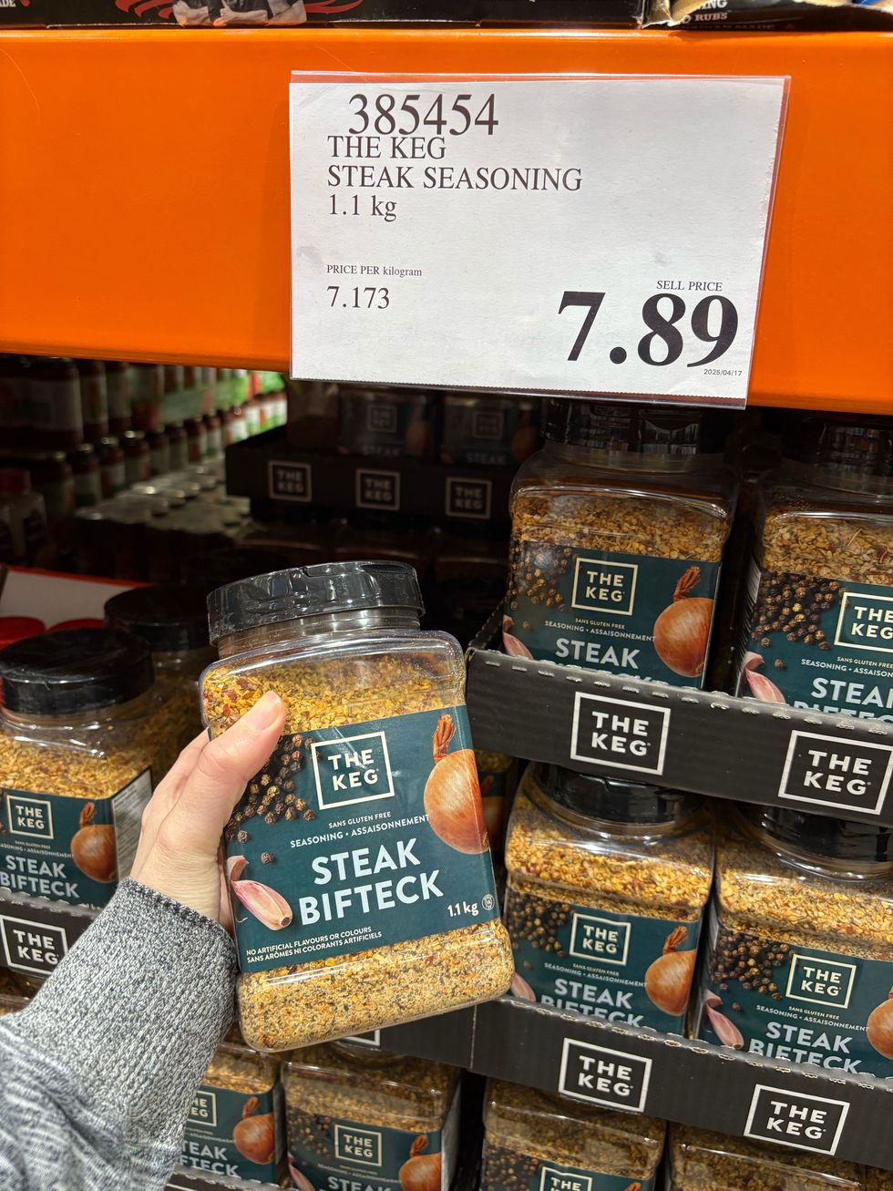 person holding bottle of the keg steak seasoning at costco