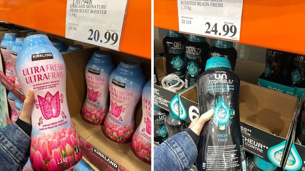 person holding kirkland signature and downy unstopables laundry beads at costco