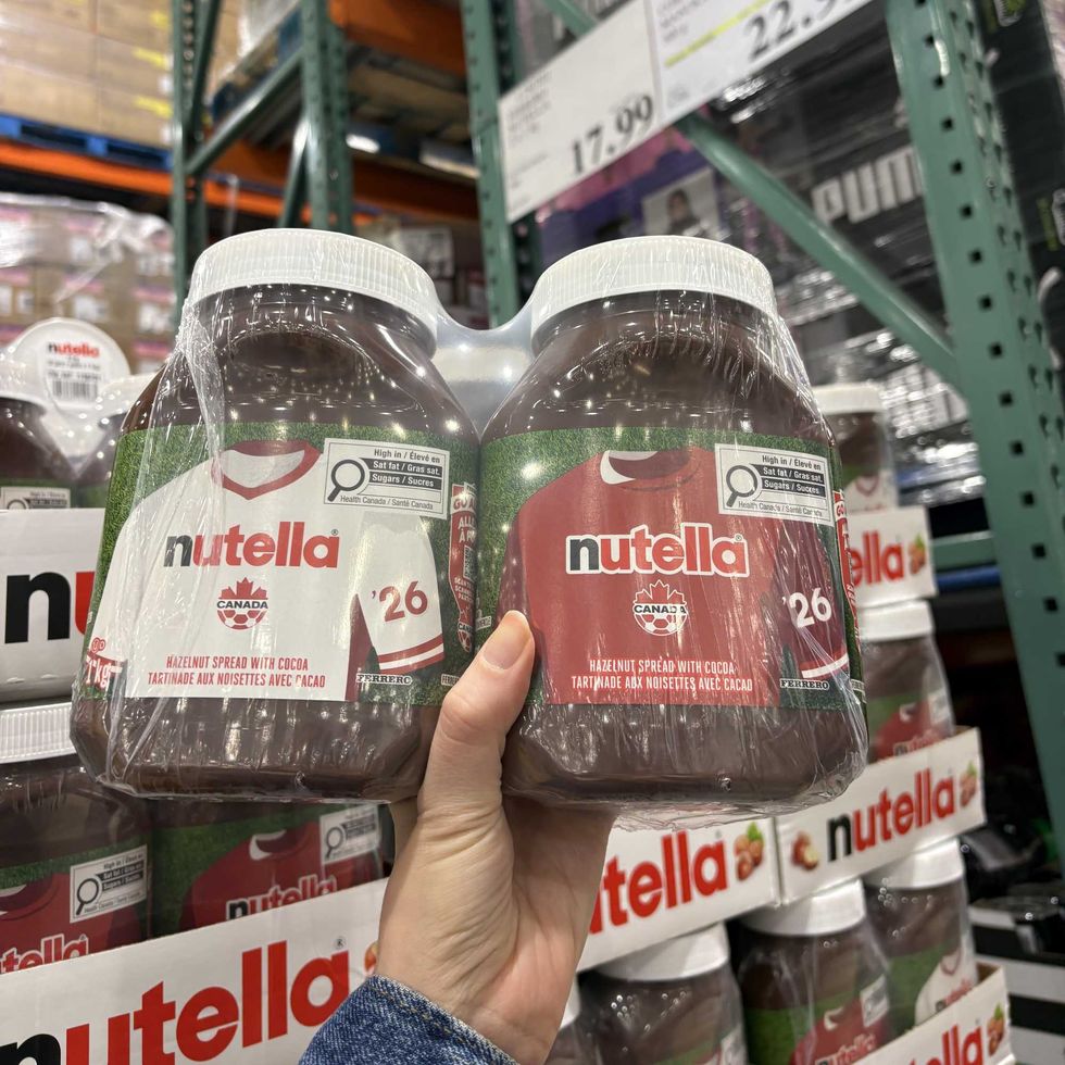 person holding pack of \u200bNutella at Costco
