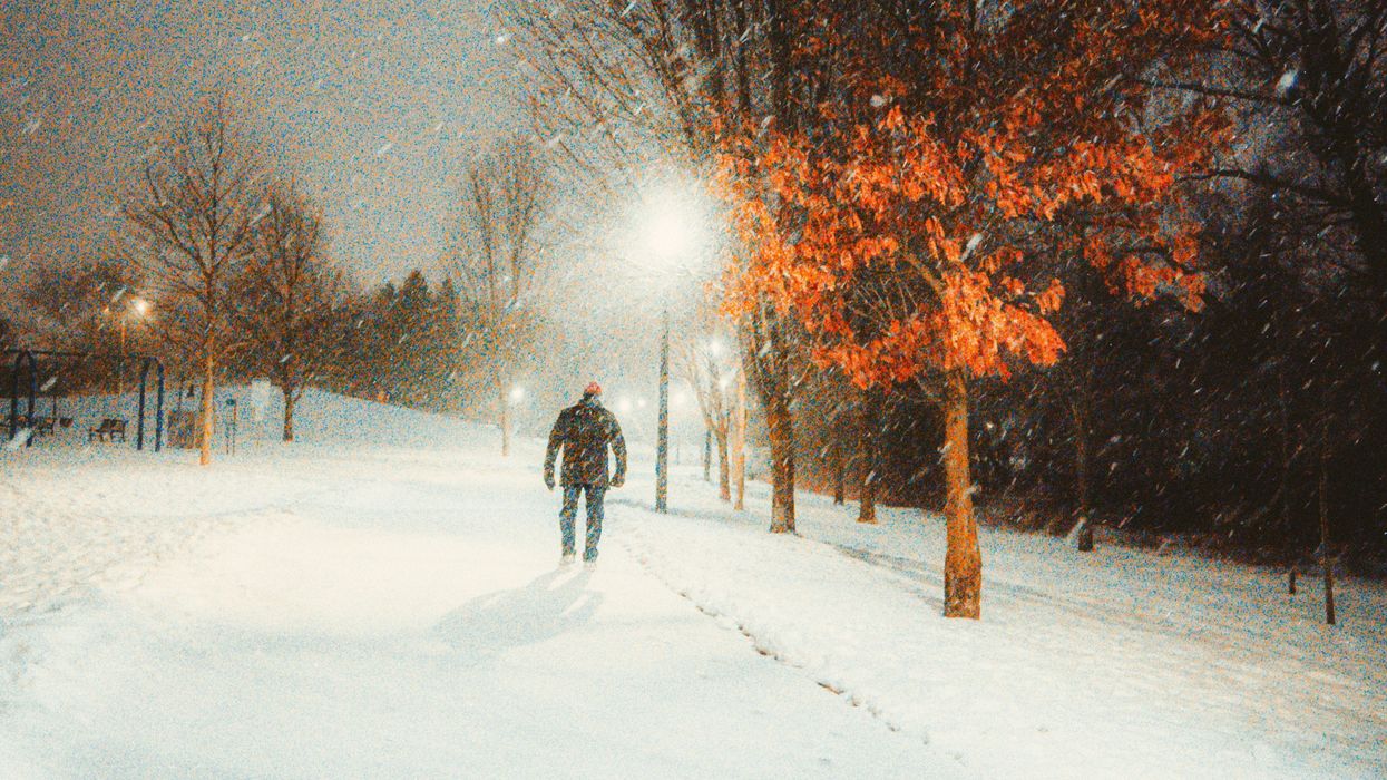 person in a snowstorm in ontario