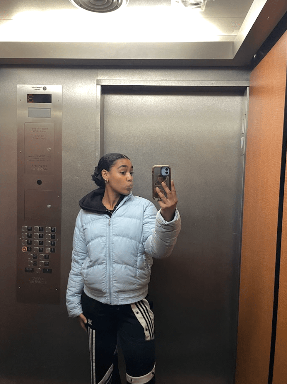 Person in an elevator.,