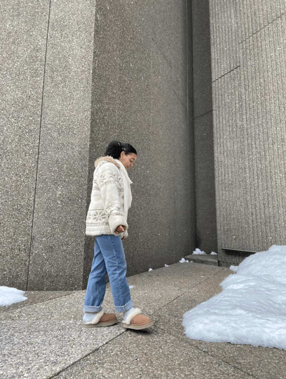 Person walking on a street.