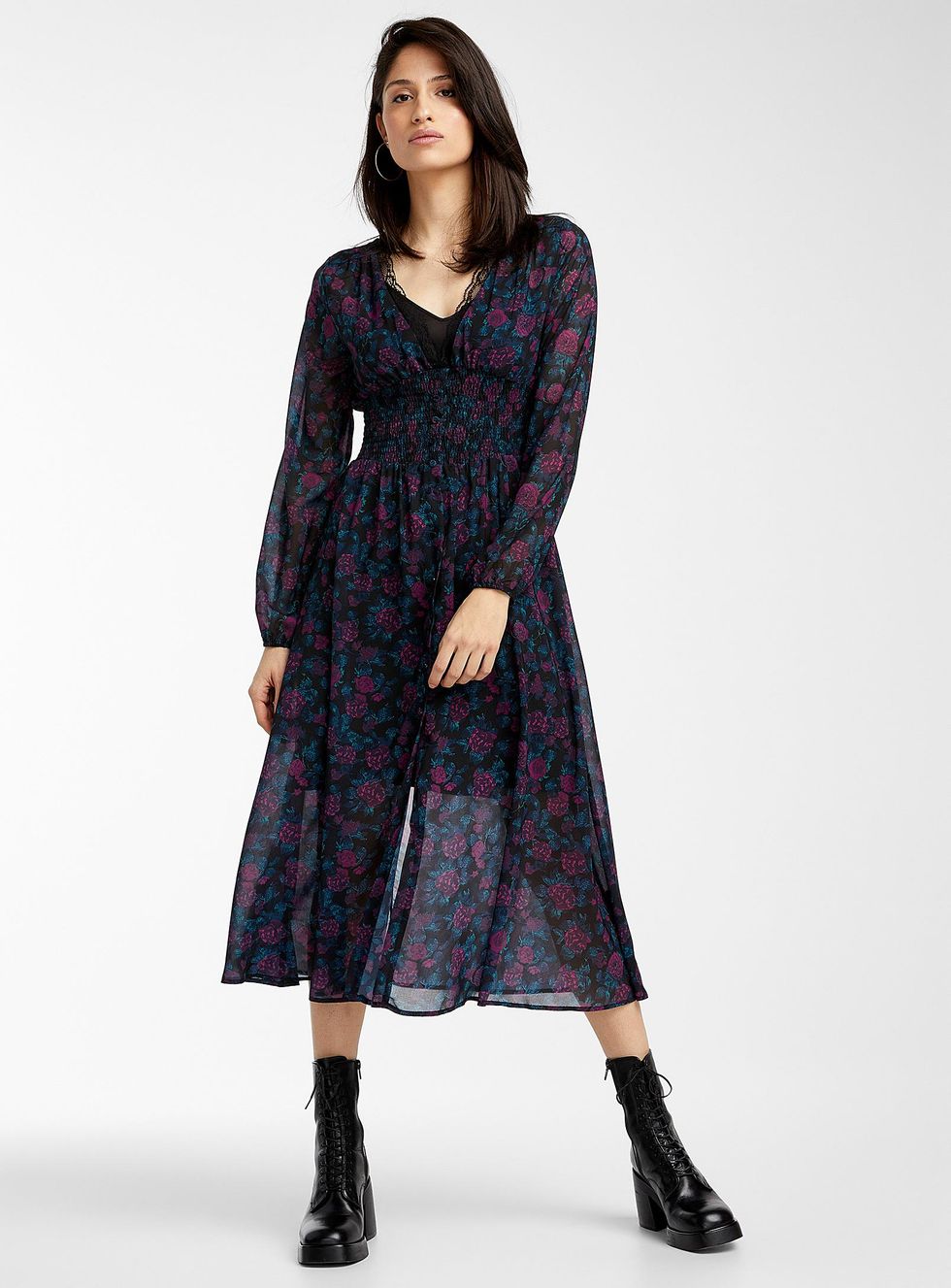 person wearing the chiffon dress with leather boots