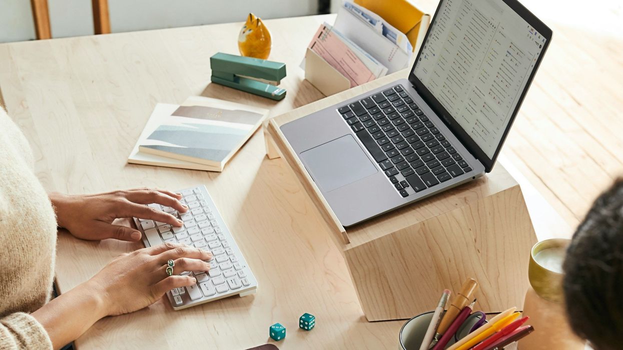 person working from home on a laptop
