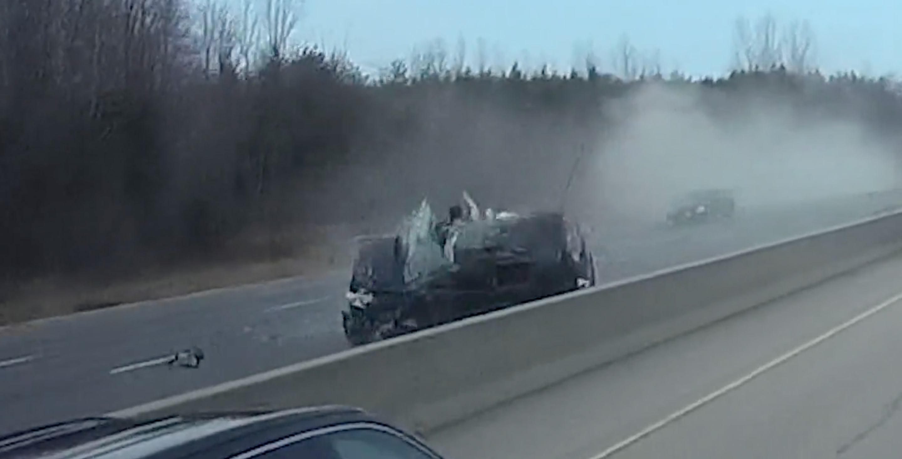Photo of a rollover collision on an Ontario highway.
