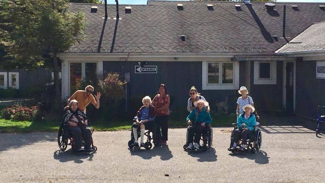 Photo of senior residents with their caregivers