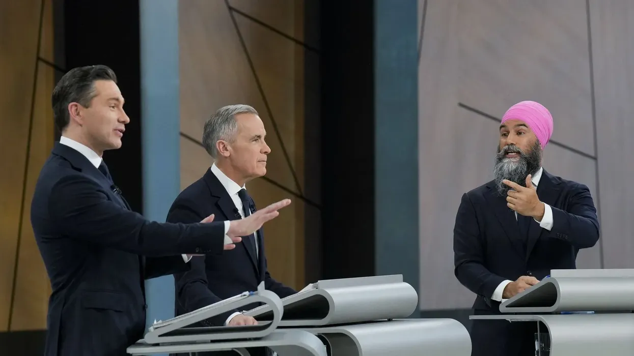 Pierre Poilievre, Mark Carney and Jagmeet Singh on Thursday's debate stage.