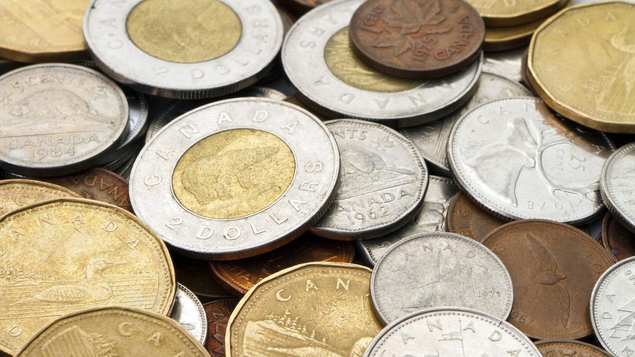 Pile of Canadian coins including a toonie.