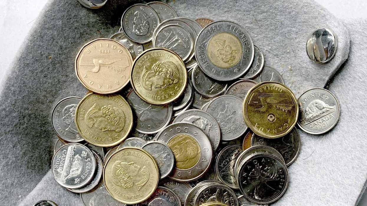 pile of canadian loonies, toonies and other coins