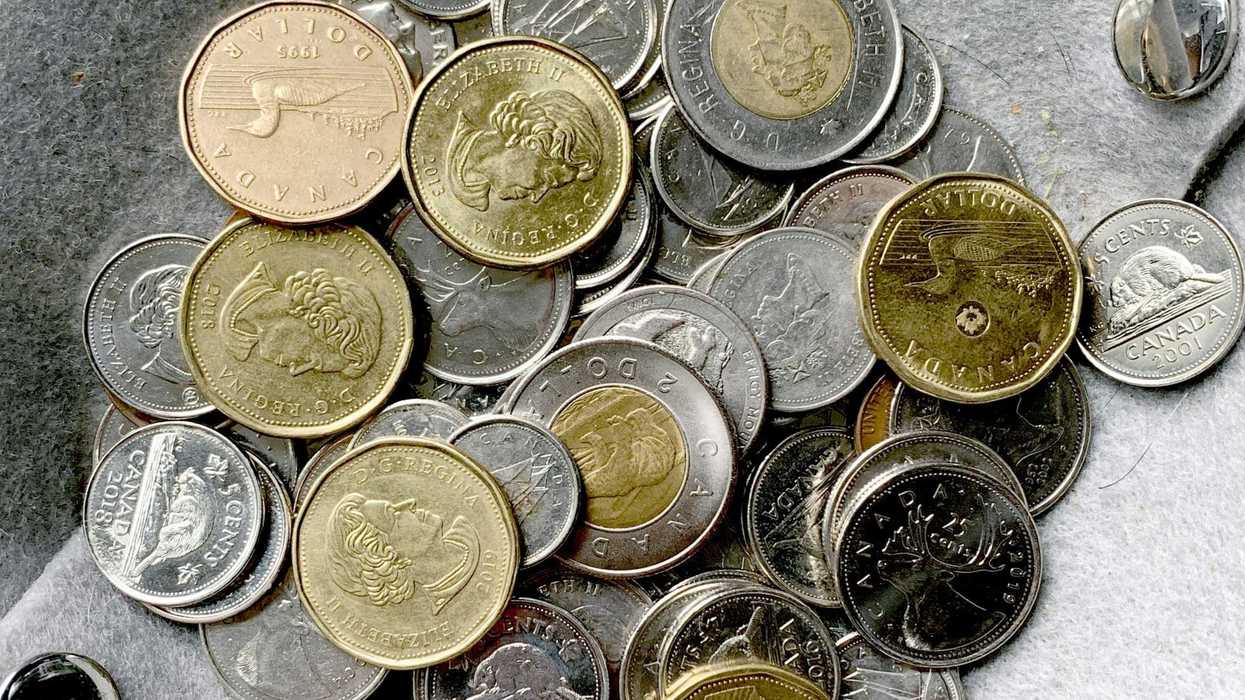 pile of loonies, toonies and other canadian coins