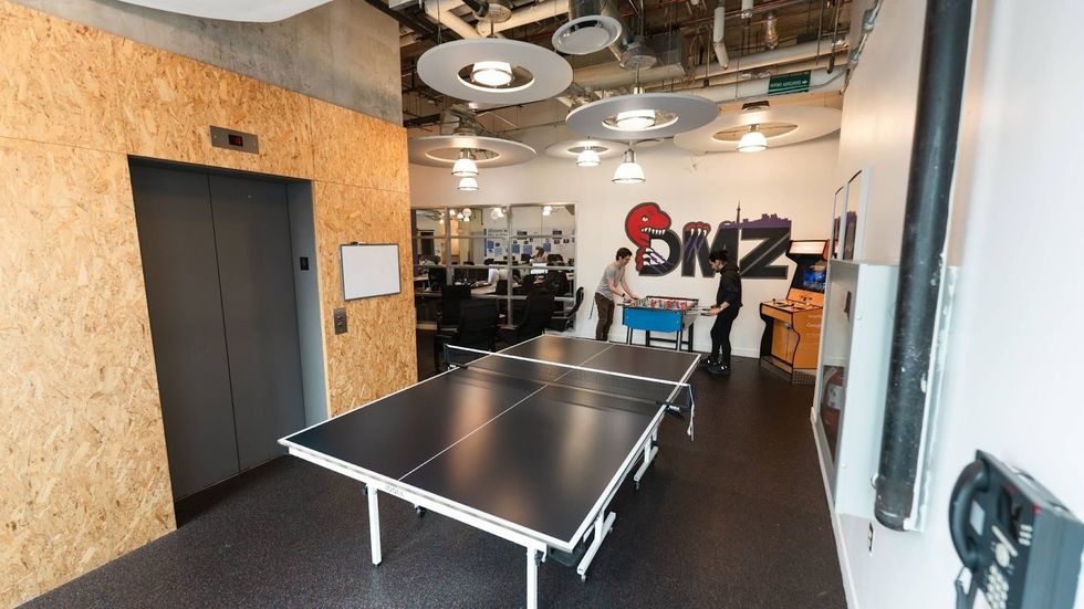 Ping pong tables and foosball at DMZ Toronto.