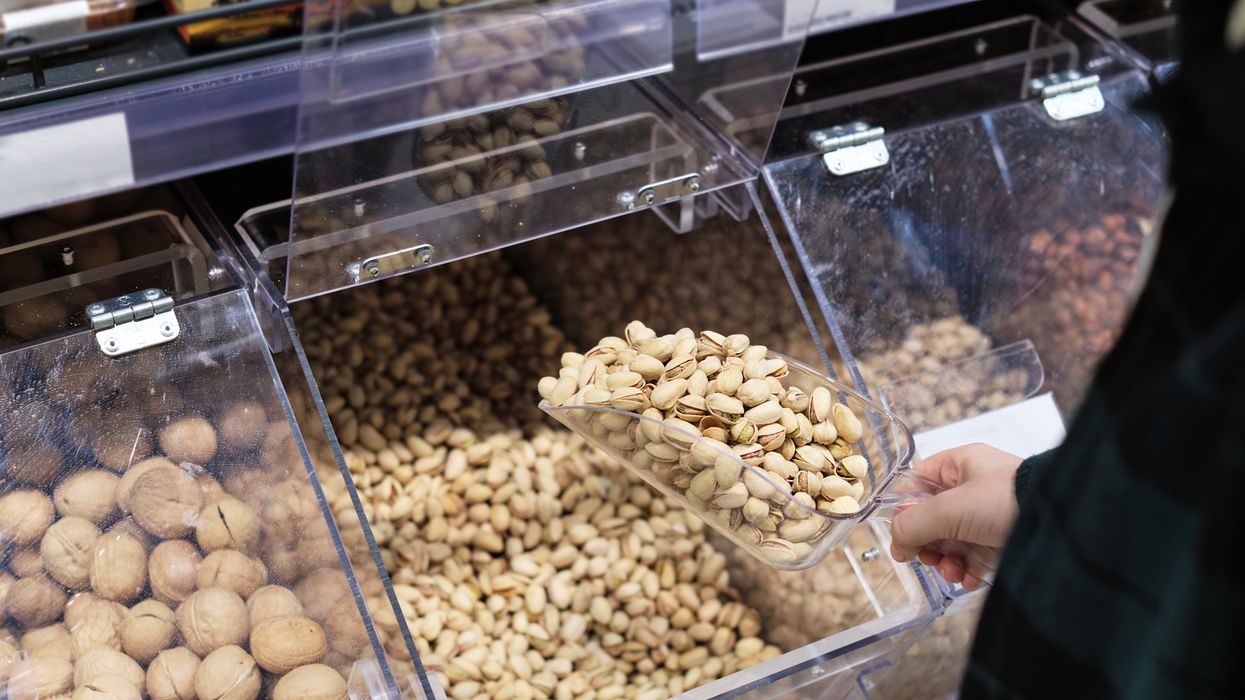 Pistachios in a bulk bin at a grocery store (illustrative).