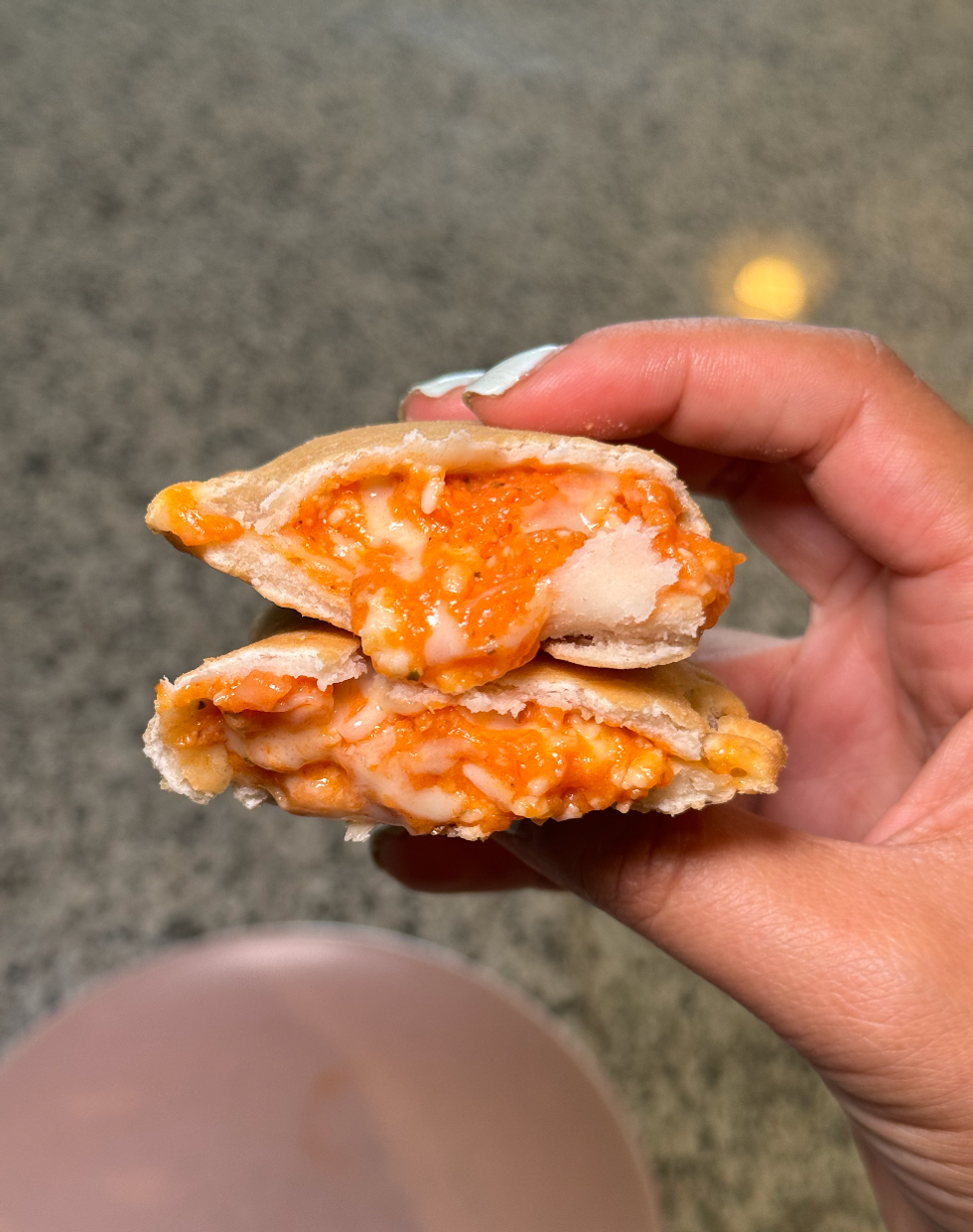 Pizza Pops cut in half.