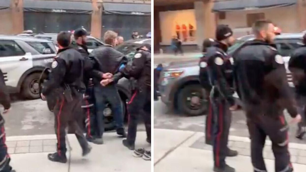 Police arrested the suspect in Toronto's Financial District.