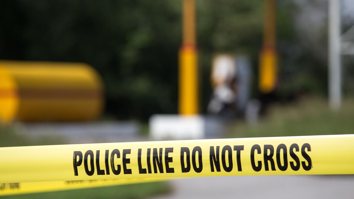 Police tape on a crime scene.