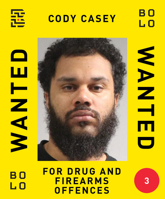 Poster with a man's mugshot and the words 
