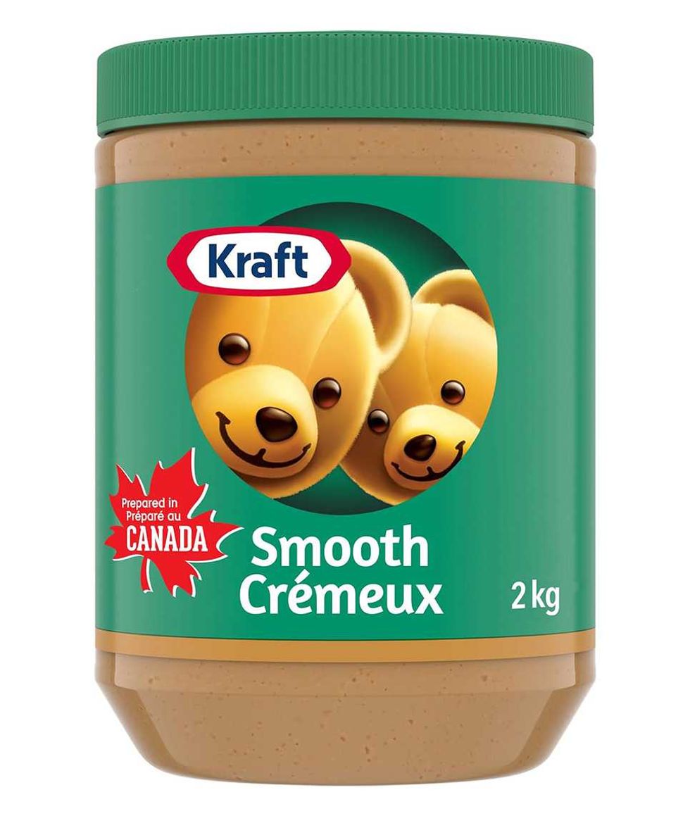 Pot de beurre d'arachide cr\u00e9meux Kraft, format de 2 kg.