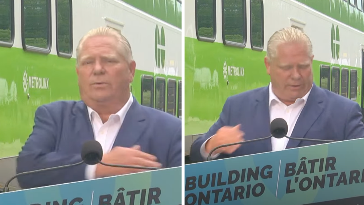 Premier Doug Ford swatting a bug away at a press conference in Niagara Falls.