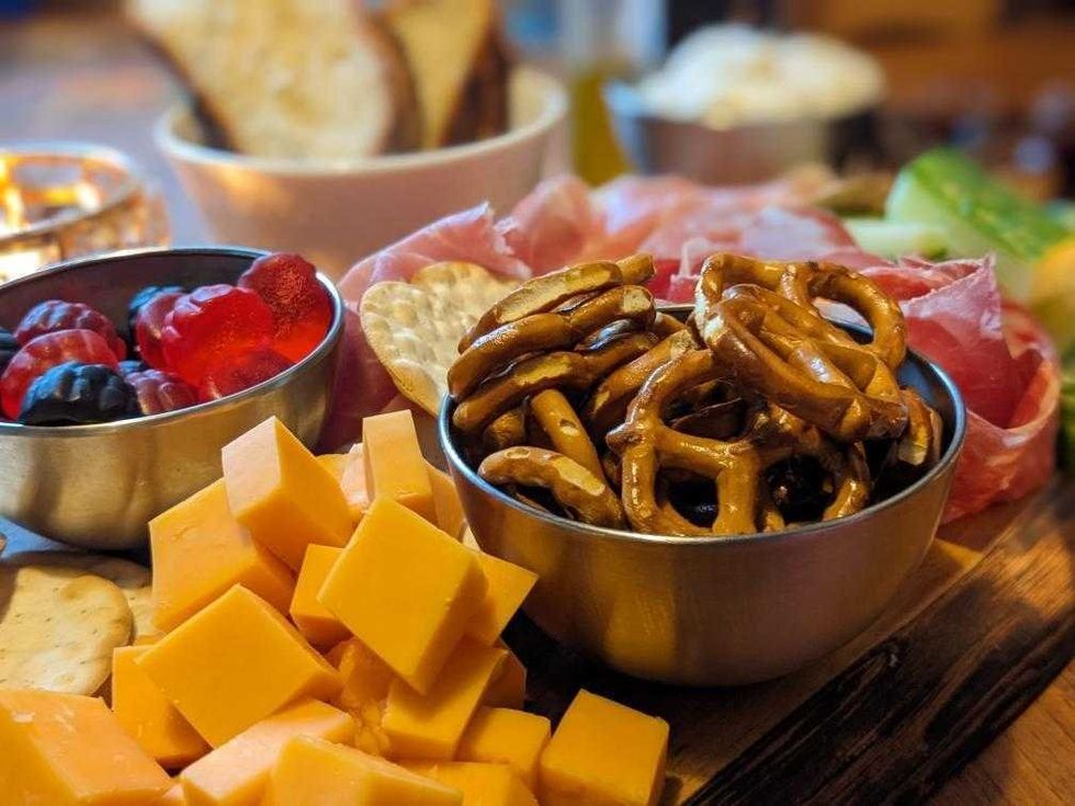 Pretzels and berry candies from Bulk Bark in bowls.