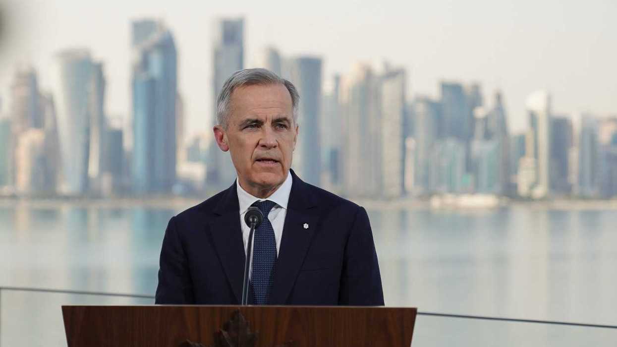 Prime Minister Mark Carney addresses a crowd from Qatar in January.