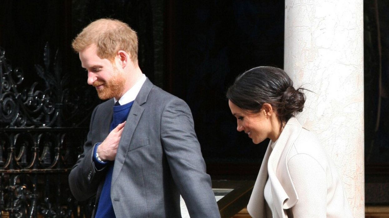 Prince Harry and Meghan Markle are shown together.
