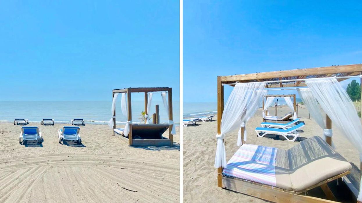 Private beach with cabanas.