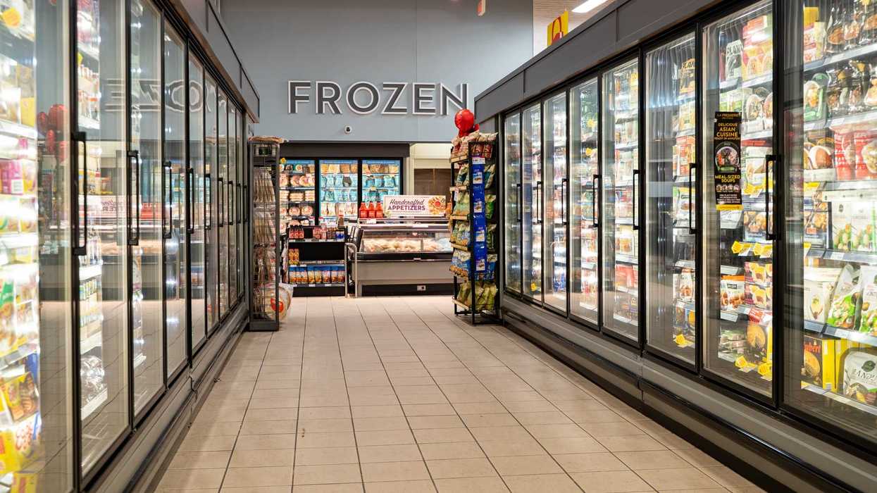 products in freezers in frozen food aisle at grocery store in canada