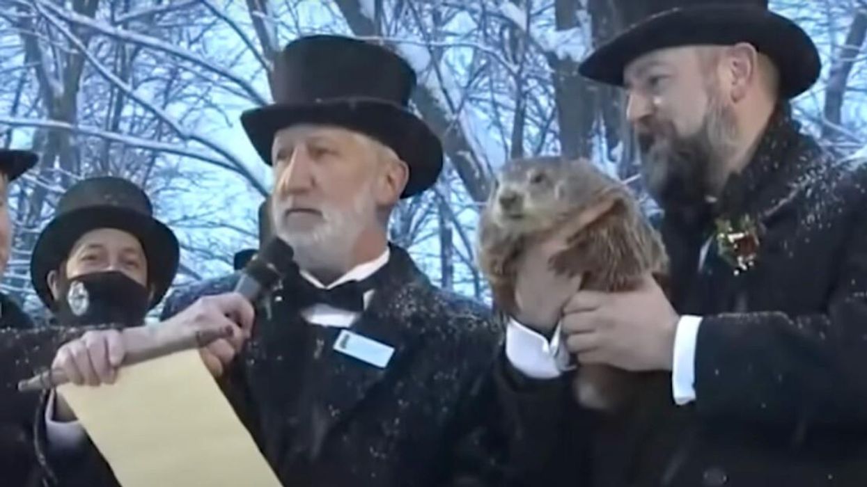 Punxsutawney Phil’s handlers make their announcement in this image from 2021.