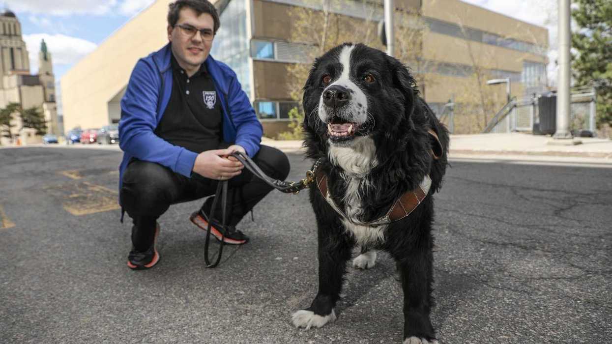 Quebecer and service dog graduate from university