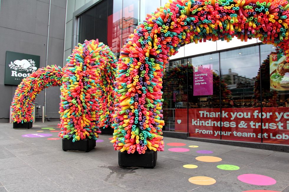 Rainbow walkway made of pool noodles in Toronto.