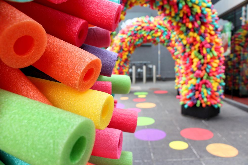 Rainbow walkway made of pool noodles in Toronto.