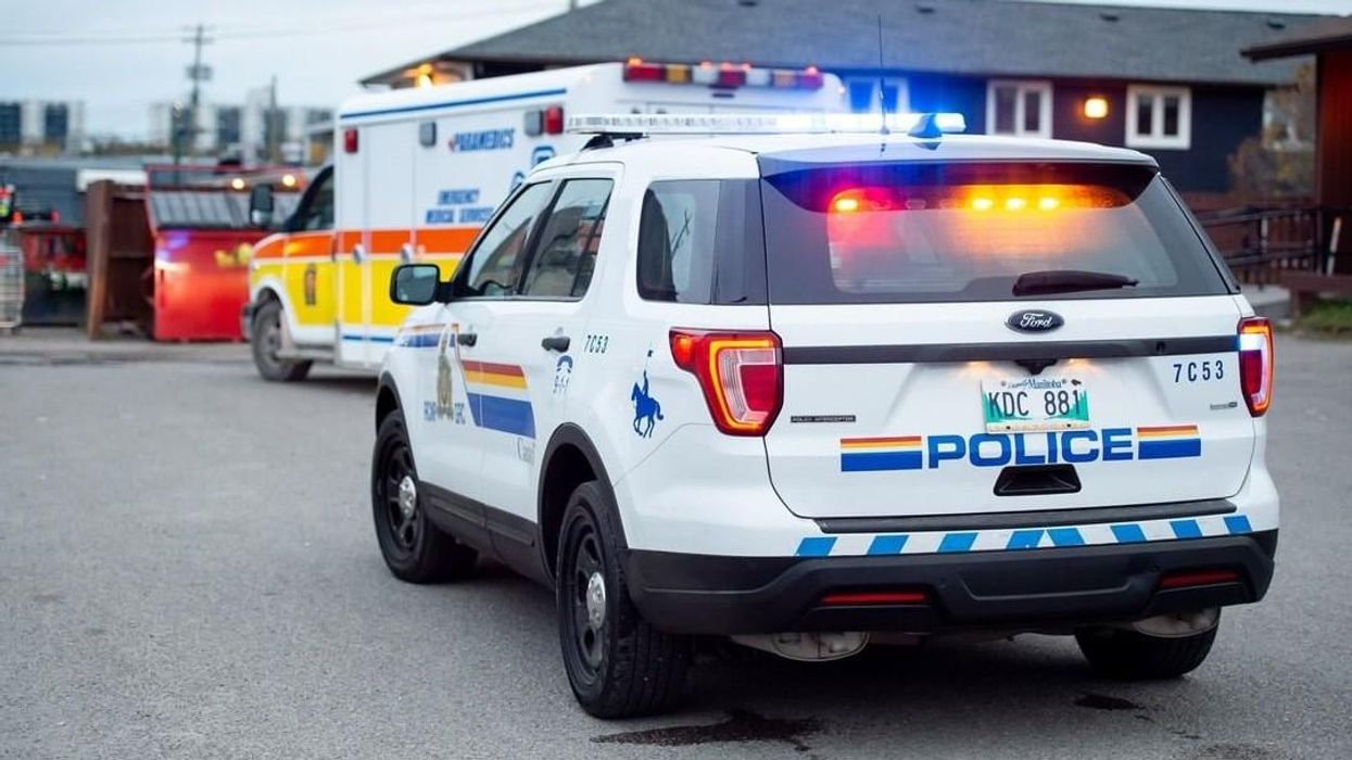 RCMP patrol car with its lights flashing in Manitoba.
