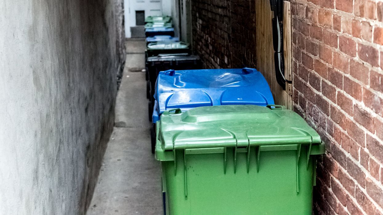 Recycling and garbage bins.