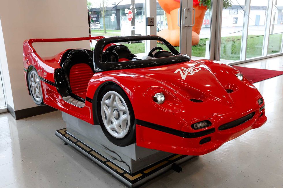 red sports car children's ride in zellers store in toronto