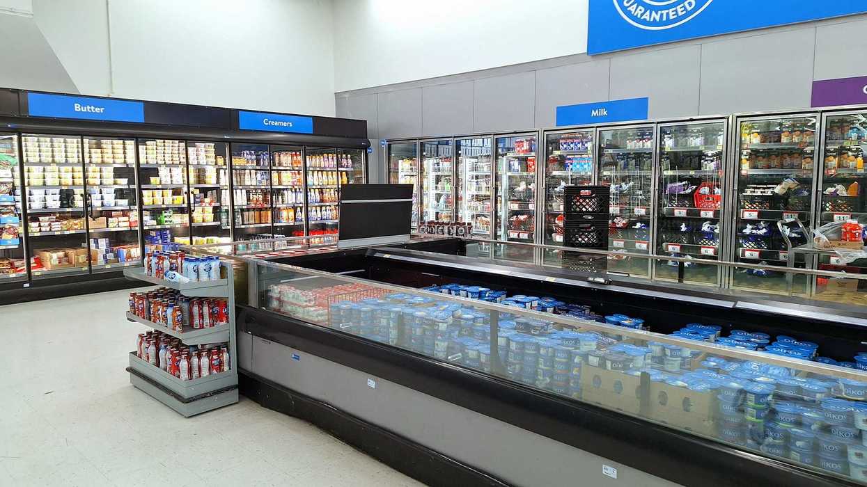 refrigerated milk section at grocery store in canada