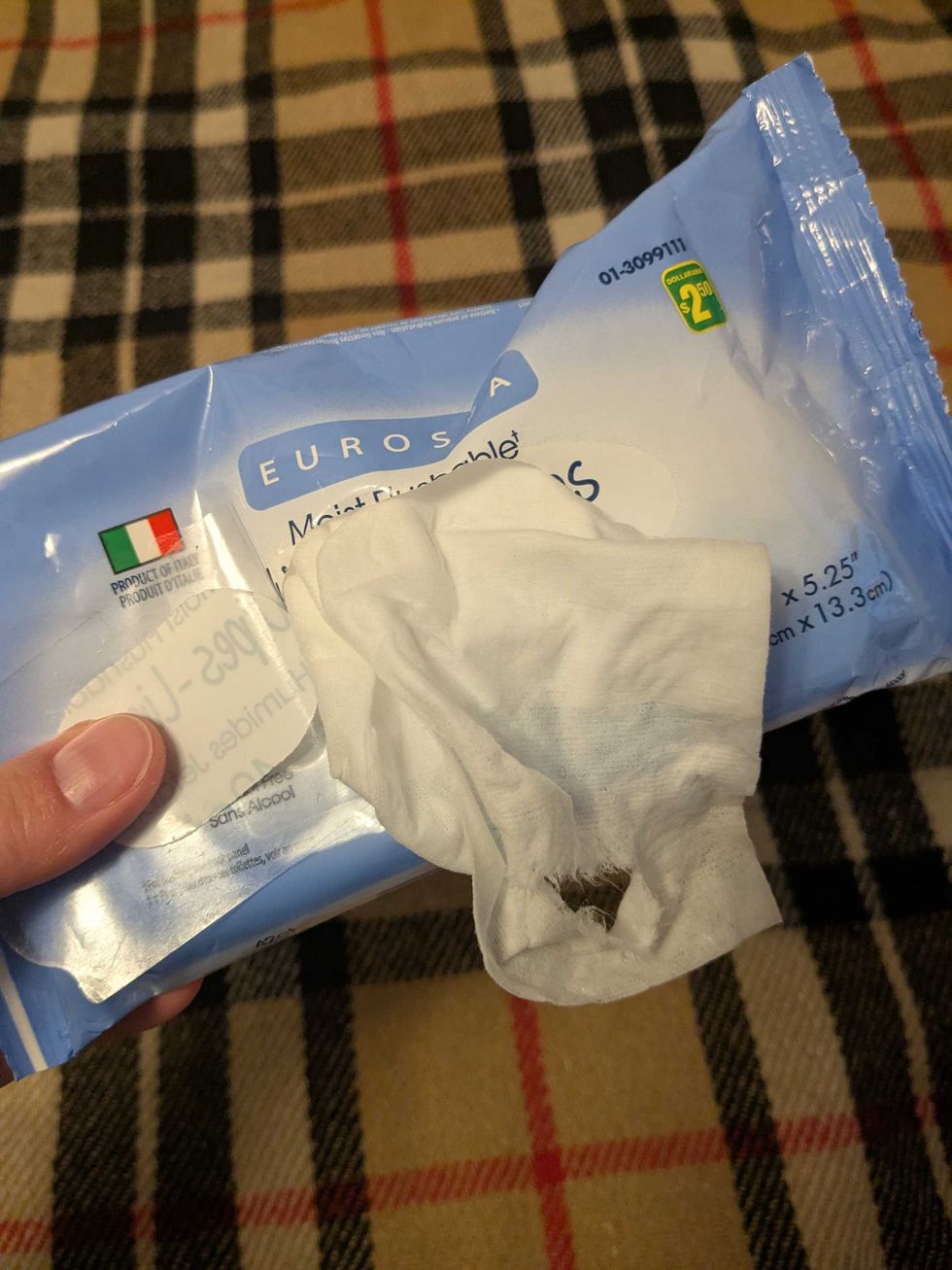Ripped wet wipe in a package
