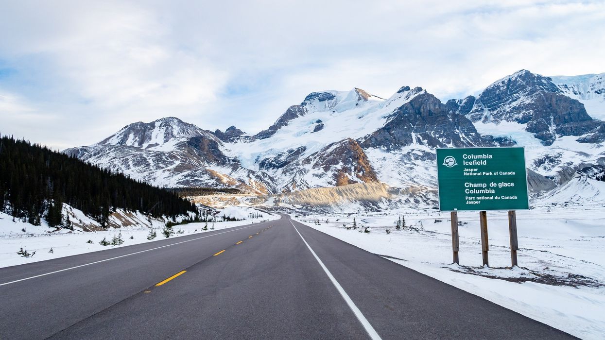 road and snowy mountains in jasper national park