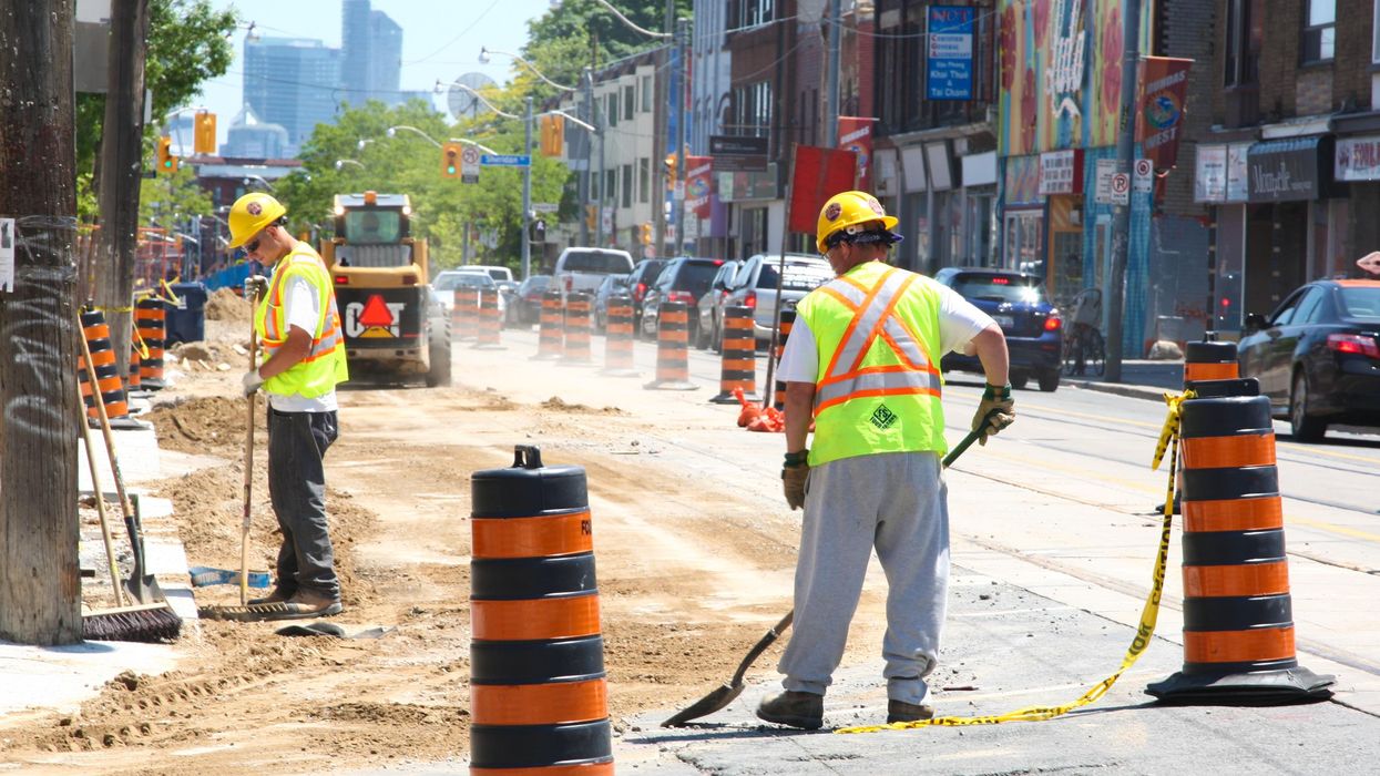 Road construction workers on a Toronto street.