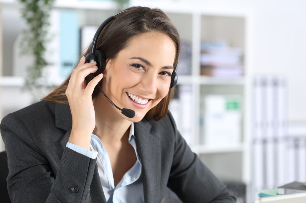 Sales representative working with a headset on.