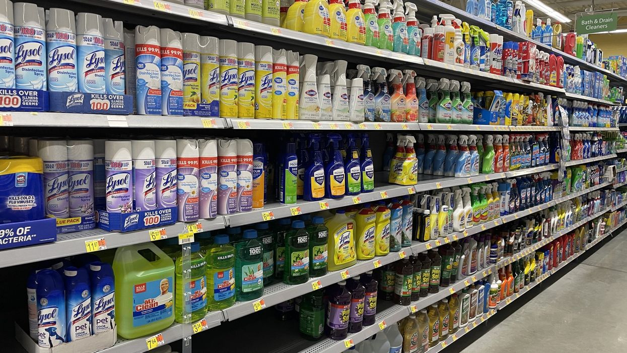 Sanitizing products at a Walmart store (illustrative only).