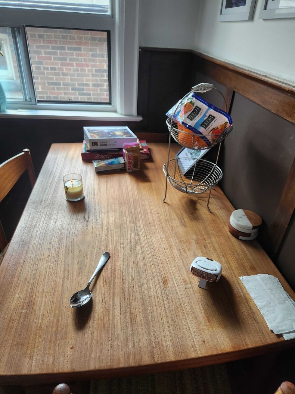 Sarah's kitchen table before the Dollarama makeover.