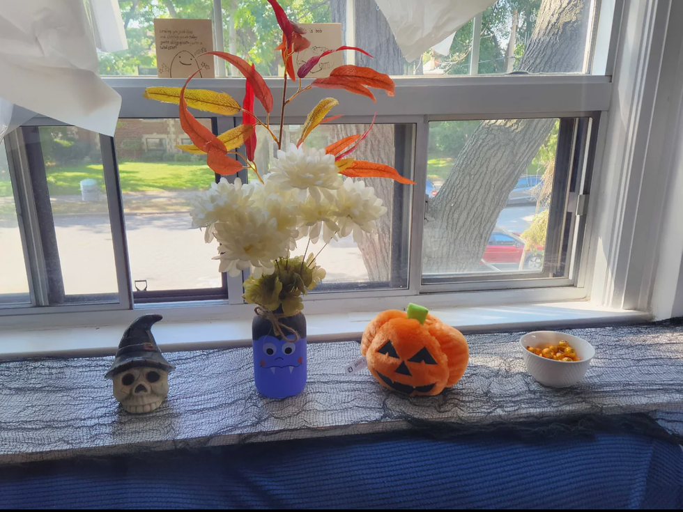 Sarah's living room with Dollarama Halloween home decor.