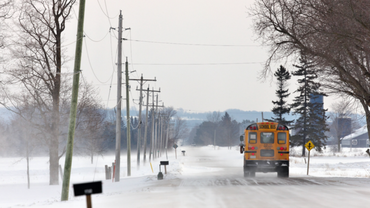 School bus on icy road.