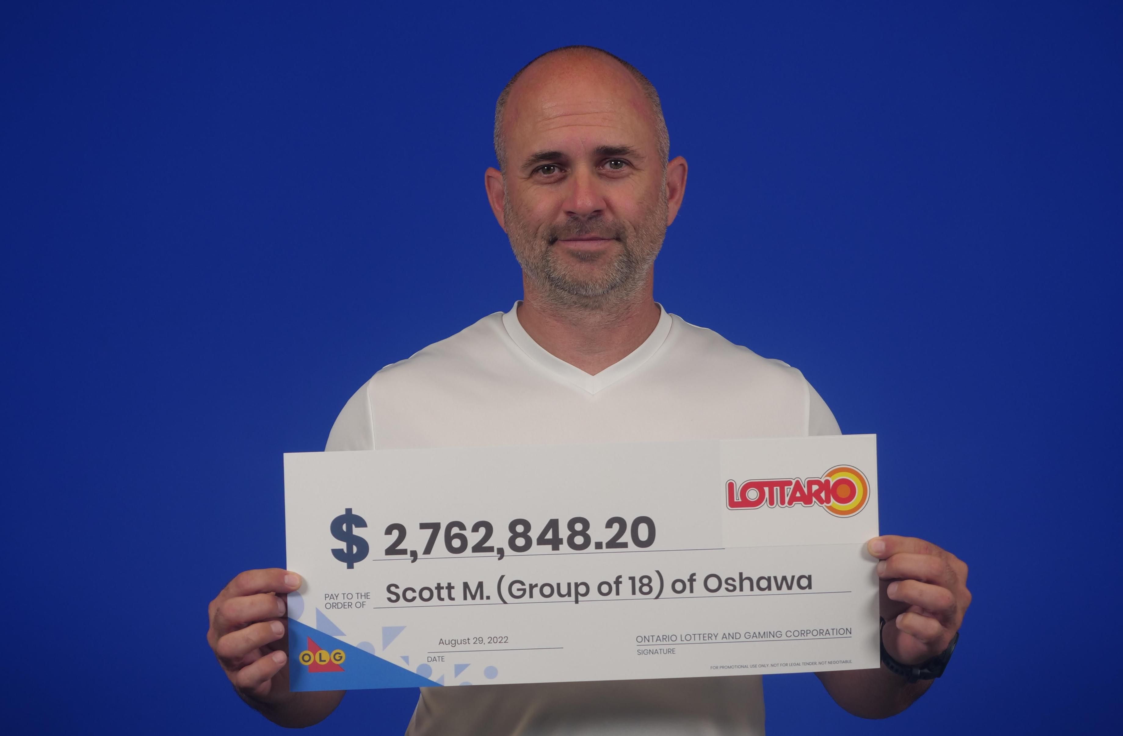 Scott McConnell, a group member who represented the group in the photo.